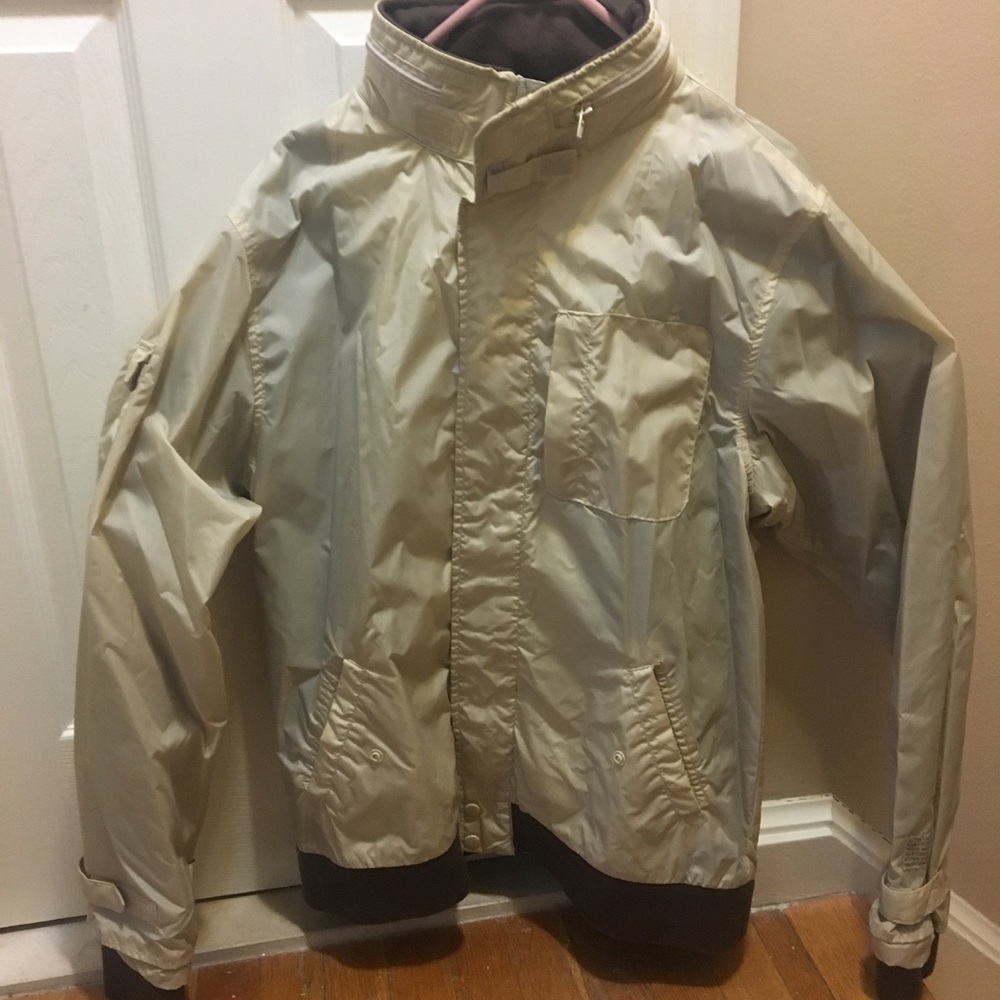 Men's windbreaker with hidden hood.